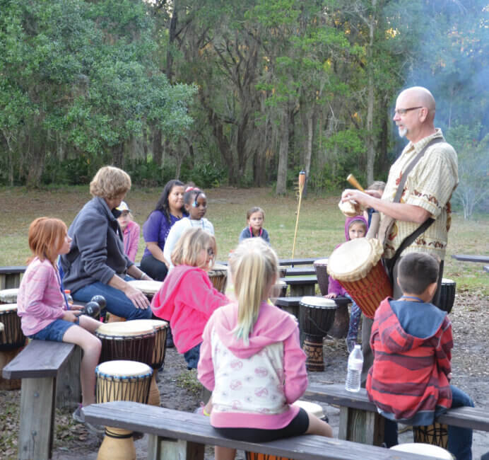 children at camp reach out